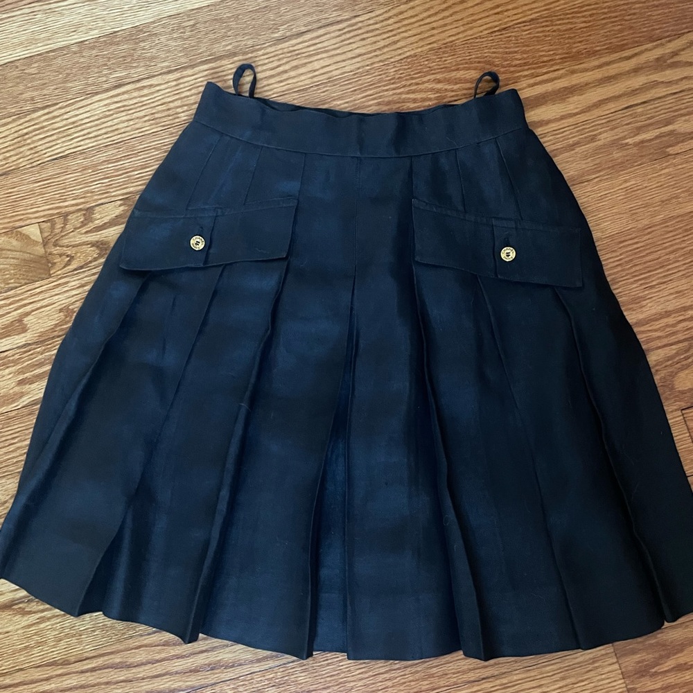Vintage Black mini Chanel pleated skirt with gold buttons